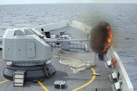 anti-surface gunnery is fired from China's Navy missile frigate Yulin