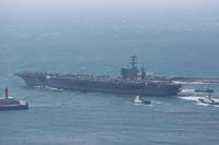 The U.S. Navy's nuclear-powered aircraft carrier USS Nimitz departs a naval base in Busan
