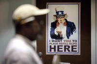 An Uncle Sam poster greets clients in a pharmacy waiting room at the Fayetteville Veterans Affairs Medical Center in Fayetteville, N.C. 