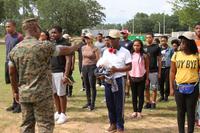Marine Corps JROTC cadets stand in formation at the Marine Corps Logistics Base Albany, Georgia.