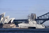 The USS Canberra (LCS-30) sails past the Sydney Opera House