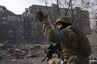Ukrainian serviceman guards his position in Mariupol, Ukraine