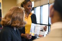 Mary Maner, University of Southern Mississippi career services assistant director, provides career information during a job fair at Keesler Air Force Base, Mississippi.