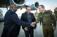 U.S. Secretary of Defense Lloyd J. Austin III greets Israeli military leaders.