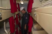 Inspects of a berthing space aboard the USS Tripoli
