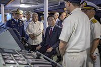 Japan's Prime Minister Fumio Kishida inside a Philippine Coast Guard ship.
