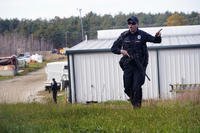 manhunt for Robert Card at a farm following two mass shootings