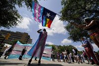 Demonstrators gather on the steps to the Texas Capitol to speak against transgender-related legislation bills