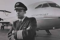 Capt. David E. Harris in front of an American Airlines 400 Astrojet