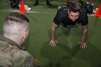 U.S. Army Sgt. Jacob Page performs hand-release push-ups during the Army Combat Fitness Test (ACFT) at Joint Base Lewis-McChord, Wash.