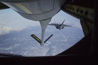 F-22 Raptor jet fighter prepares to hook up to an Alaska Air National Guard KC-135 Stratotanker
