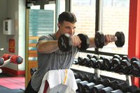 A Marine participates in a weightlifting competition at the Daniels Family Fitness Center aboard Marine Corps Logistics Base Albany, Georgia.