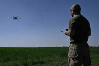 Ukrainian serviceman runs tests flights with a Vampire hexacopter drone