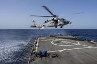 An HSC-7 helicopter lands on the USS Laboon in the Red Sea