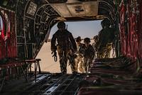 U.S. Army soldiers board a CH-47