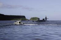 The guided-missile submarine USS Ohio departs Apra Harbor in Guam