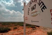 A sign directs travelers to the start of the &quot;1947 UFO Crash Site Tours&quot; in Roswell, N.M.,