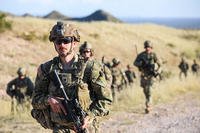 U.S. Army soldiers conduct a patrol during a live-fire training exercise near Fort Bliss