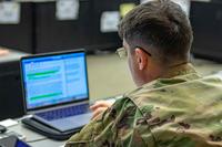 Soldier works on a computer.