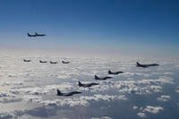 U.S. Air Force, South Korean and Japanese fighter jets fly during a trilateral air drill.