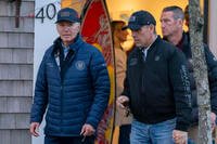 President Joe Biden and son Hunter Biden walk in downtown Nantucket Mass.