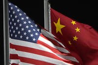The American and Chinese flags wave at Genting Snow Park ahead of the 2022 Winter Olympics