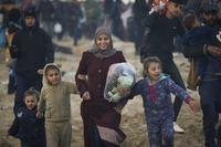 Displaced Palestinians return to their homes in the northern Gaza Strip