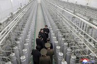 Kim Jong Un, second from top, inspects a facility that produces nuclear material