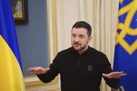 Ukrainian President Volodymyr Zelenskyy speaks to journalists during press conference in Kyiv.