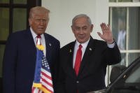 Israel's Prime Minister Benjamin Netanyahu is greeted by President Donald Trump
