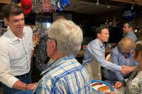 Retired Army Capt. Sam Brown and Adam Laxalt