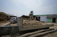 Indian child walks on a bunker near India - Pakistan International border