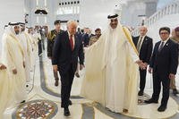 Qatar's Emir Sheikh Tamim bin Hamad Al Thani welcomes President Trump
