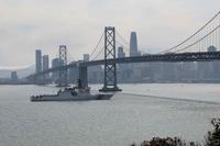 Coast Guard Cutter Waesche approaches the San Francisco Bay Bridge