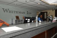 A Whiteman Inn accounting technician takes a phone call from a customer