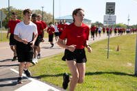 Individuals scheduled for boot camp complete a 1.5-mile run during a Marine Corps Recruiting Station Jacksonville pool function March 22, 2025, at Marine Corps Support Facility Blount Island in Jacksonville, Florida.