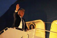 President Trump boards Air Force One at Calgary International Airport