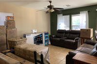 Moving boxes sit in a U.S. Air Force airman’s home in Las Vegas