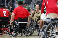U.S. Army Sgt. Carson Shaw of Team SOCOM congratulates a member of Team Marine Corps after a game of wheelchair basketball at the 2025 Department of Defense Warrior Games in Colorado Springs, Colorado.