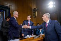 Committee Chairman Sen. Jerry Moran, R-Kan., left, and ranking member Sen. Richard Blumenthal, D-Conn., center, greet Secretary of Veterans Affairs Doug Collins during a Senate Committee on Veterans Affairs hearing to examine veterans at the forefront, focusing on the future at the U.S. Department of Veterans Affairs, on Capitol Hill, Tuesday, May 6, 2025, in Washington.