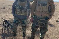 Abdul Rahman Waziri, right, an Afghan refugee who was fatally shot at his Houston apartment complex