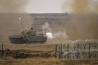 A tank fires during the Steadfast Dart 2025 exercise