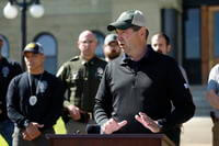Montana Attorney General Austin Knudsen speaks to the media