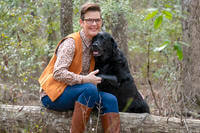 ‘After Action’ host and producer Stacy Pearsall is shown with her service dog, Charlie.