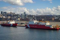 U.S. Coast Guard Cutter Polar Star (WAGB 10) (left) sits moored next to U.S. Coast Guard Cutter Healy (WAGB 20) at Coast Guard Base Seattle