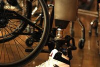 A prosthetic leg stands behind the sidelines during practice in the Marine Corps Trials in Camp Pendleton, Calif., Feb. 16, 2012. Many wheelchair basketball athletes have not been in a wheelchair for very long and are still getting used to using and playing in one. (Michael Guinto)
