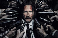 Keanu Reeves as John Wick surrounded by gunmen in John Wick: Chapter 3 – Parabellum Photo courtesy of Lionsgate.