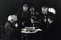 Francis Ford portraying Abraham Lincoln signing a document in a 1915 silent film. Courtesy Historic Films Greenport