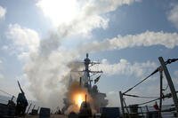 A missile being launched from a U.S. Navy ship.