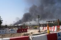 Smoke rises after an Iranian drone attack in the port area of Dubai.